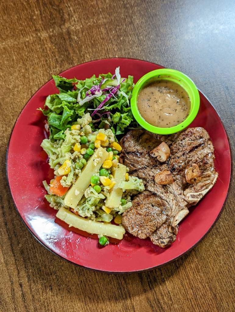 T-bone beef steak at Green & Pepper Restaurant in Bashundhara